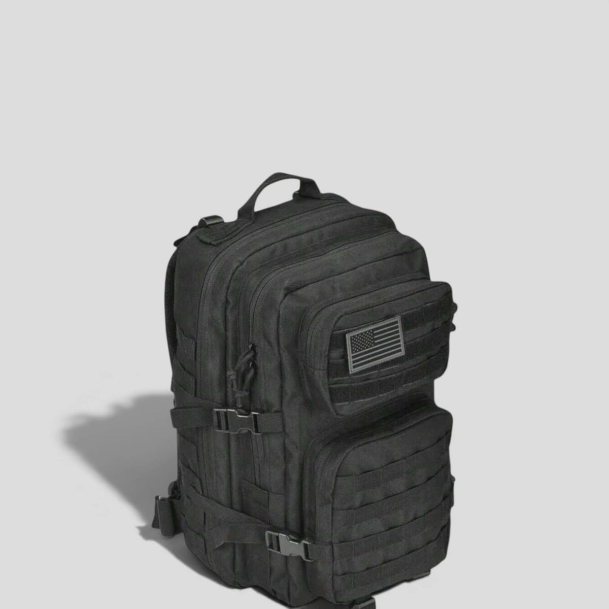 Black onyx tactical military backpack with MOLLE webbing, three front zip pockets, American flag patch, and sternum strap buckle