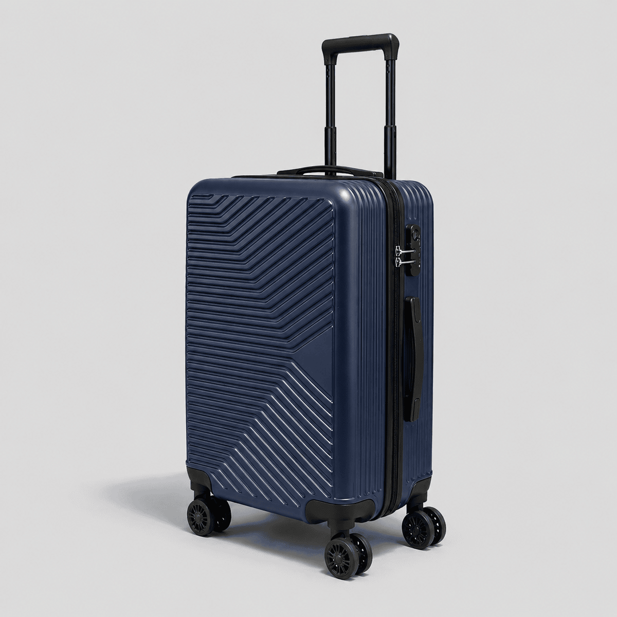 Navy blue hardshell carry on luggage with diagonal chevron ribbed exterior, black telescoping handle, TSA lock, and 360 spinner wheels
