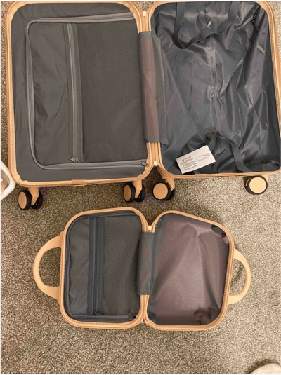 Open roamio atlas with a smaller travel pouch on a textured surface