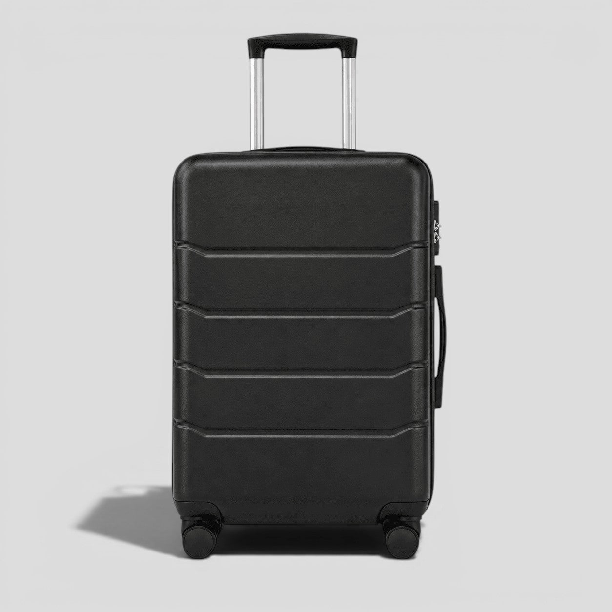 Black onyx hardshell large suitcase with horizontal ribbed exterior, extended telescoping handle, and four 360 degree spinner wheels
