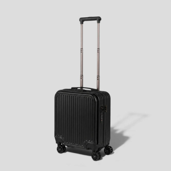 Black onyx hardshell small carry on luggage with extended telescoping handle, ribbed exterior, 360 spinner wheels, and front zip pocket
