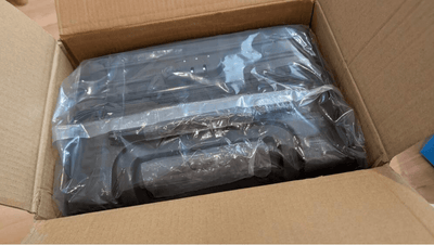 Box containing mini roamio suitcase